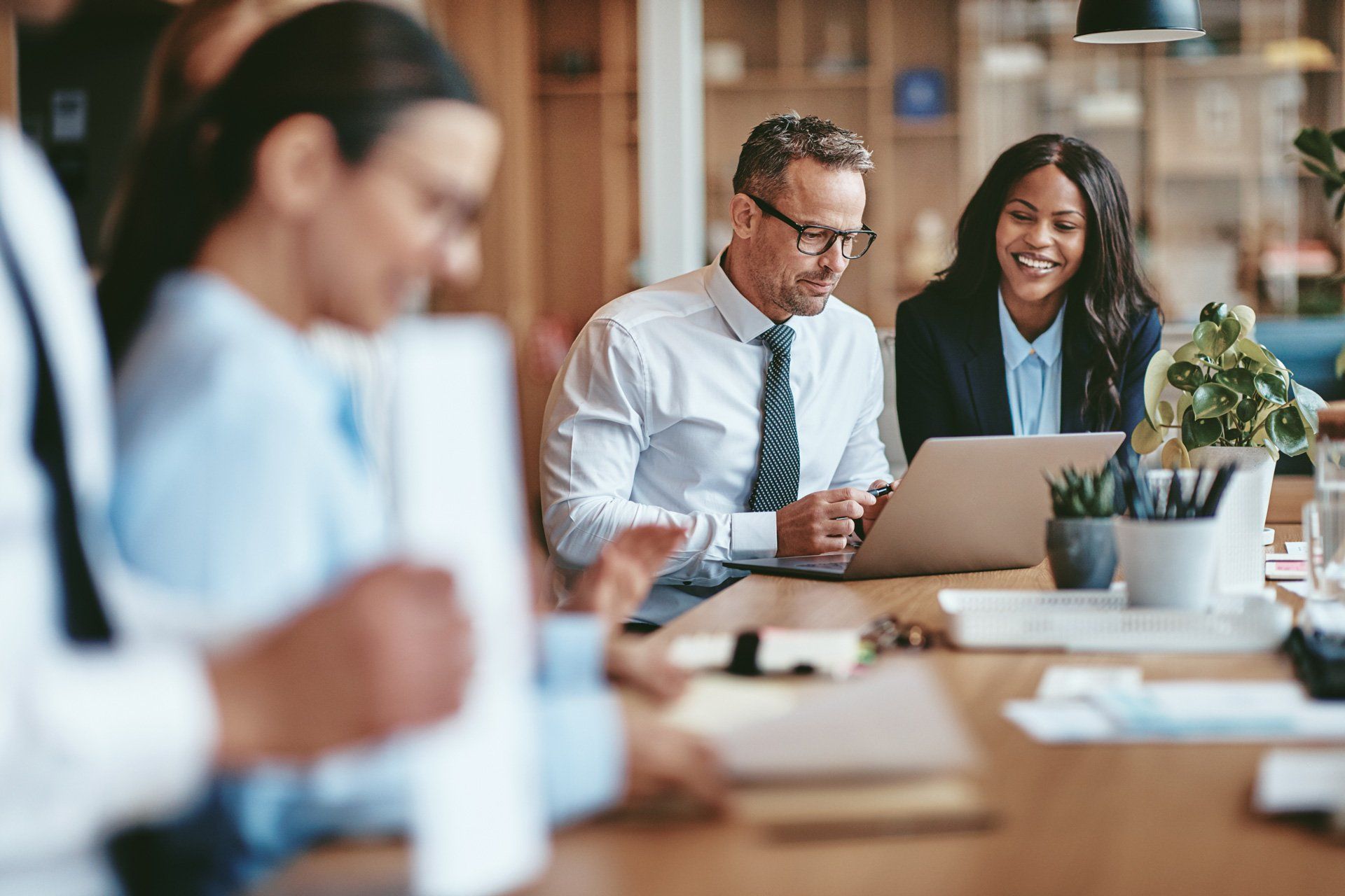 Accounting professionals reviewing financial information together